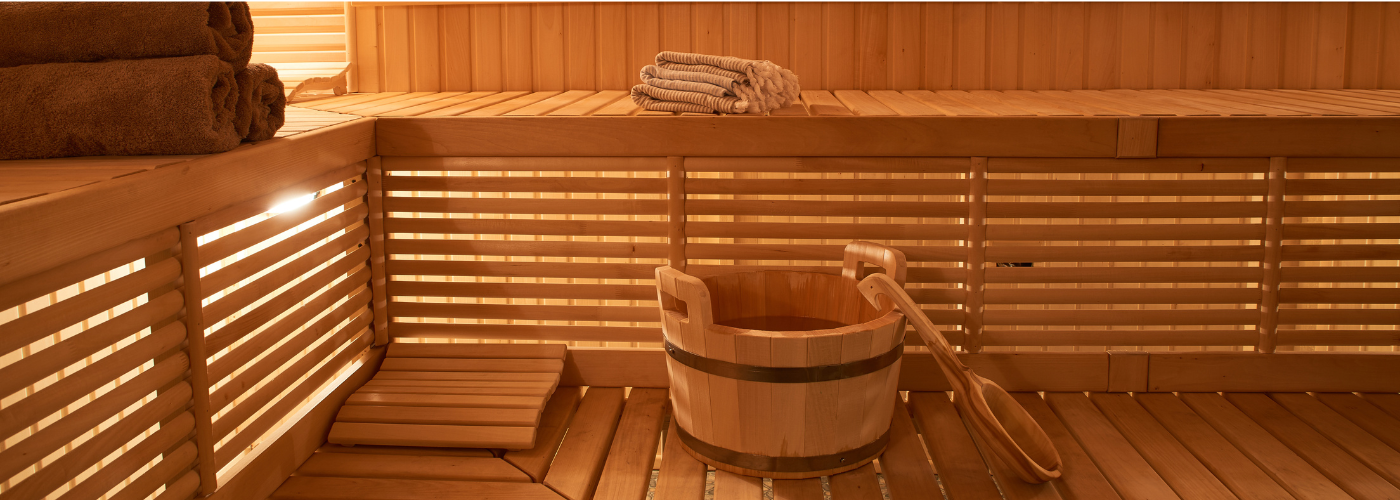 7 Sauna Health Benefits for Heart Health, Muscle Recovery, Detox, and More background image