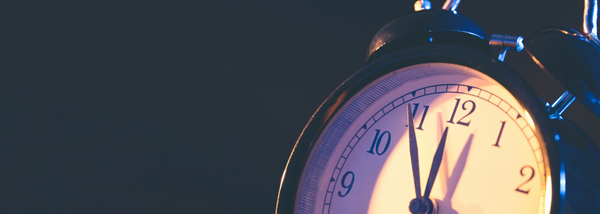 The image conveys themes of time, urgency, and anticipation.