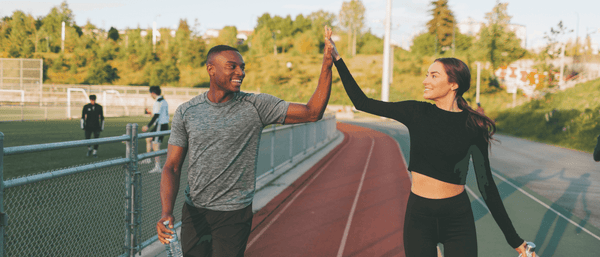 Exercise friends high-fiving