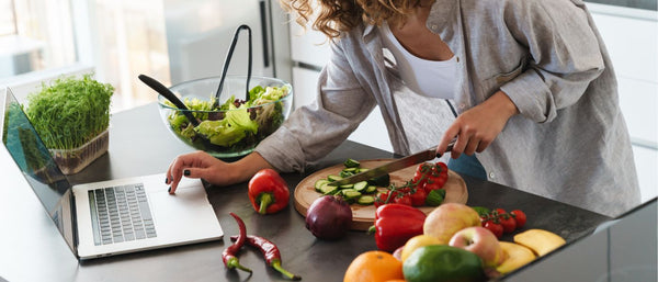 woman cutting vegetables