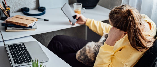 woman on her phone at work