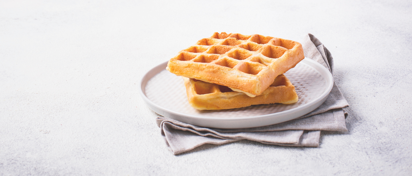 Recipe: Banana Apple Waffles With Sunflower Maple Syrup background image