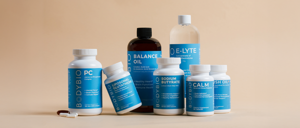 A collection of BodyBio dietary supplements with blue labels.