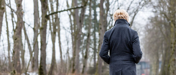 woman outside in winter forest