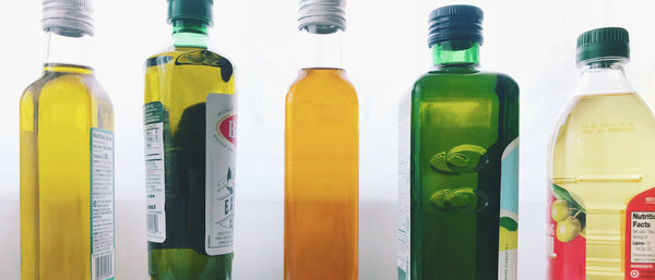 line of bottles of different cooking oils